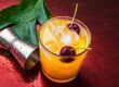 Summertime Orange Drink with Ice and Cherries